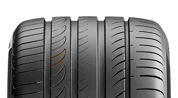 Opona prezentująca zakrzywione nacięcia